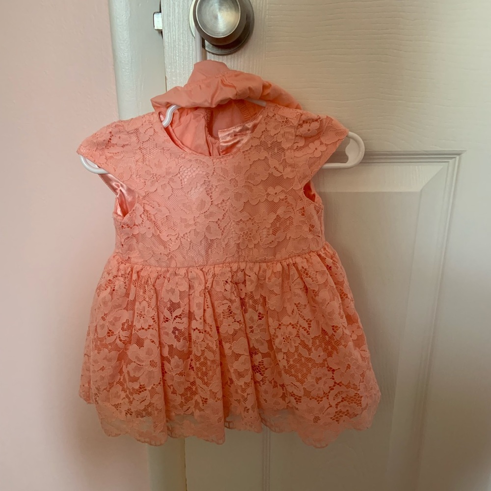 Peach lace dress for baby girl.